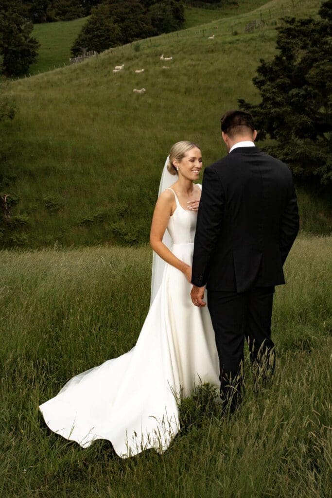 Gown and Altar bride Abby wearing the Celine Gown and Lovely Veil