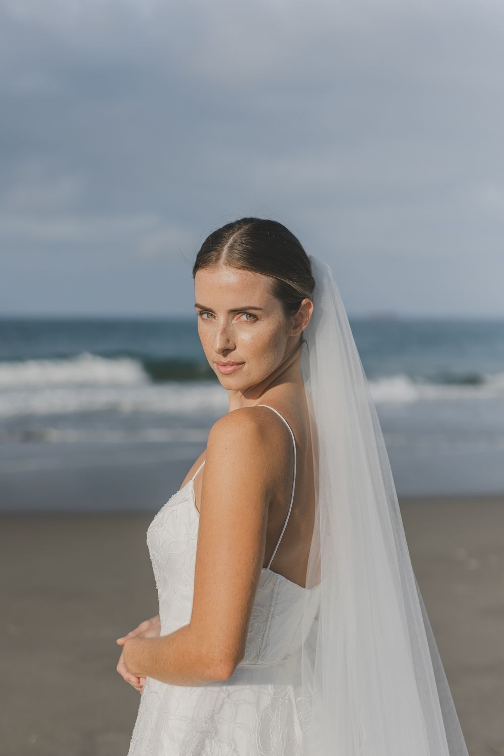 Ivory tulle wedding veil detail