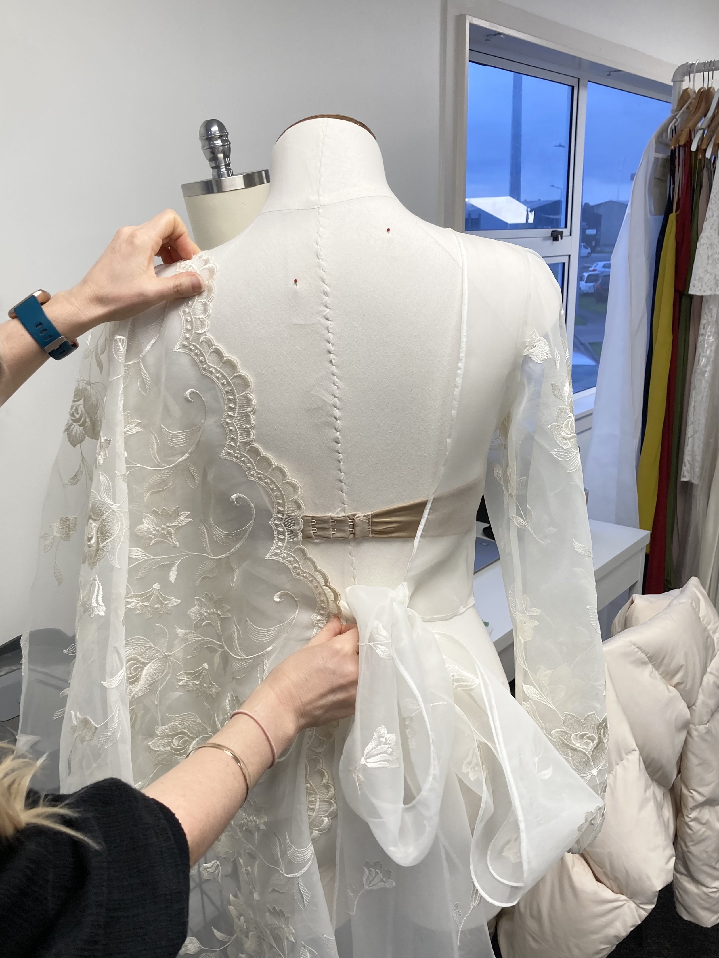 Planning the placement of the lace trim for the back v