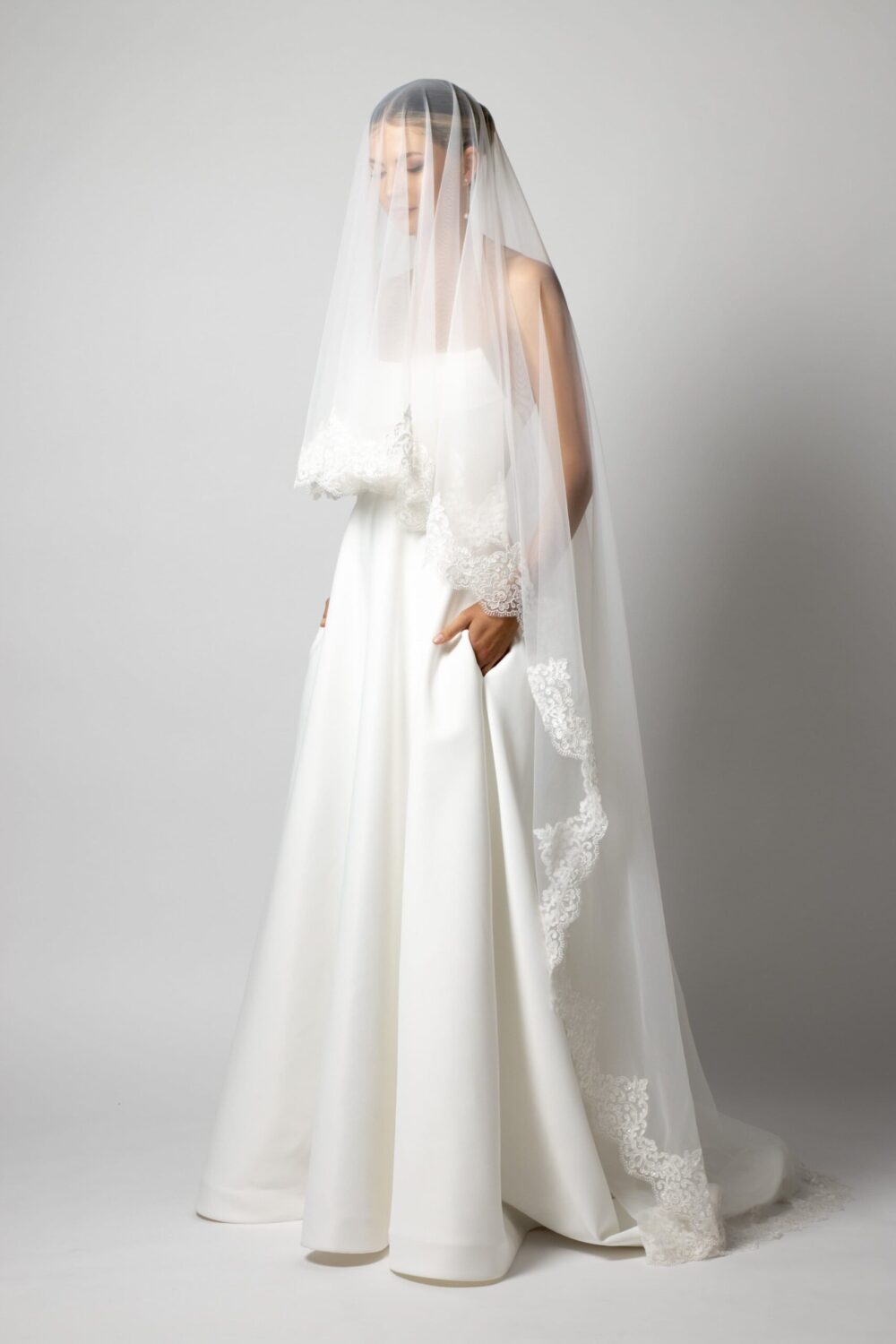 Rosella wedding veil with the blusher worn over the face