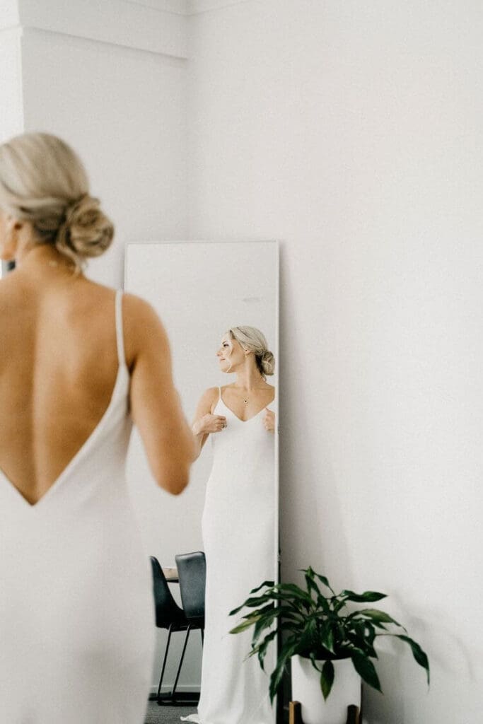 Real bride wearing the Grace Gown by Gown & Altar