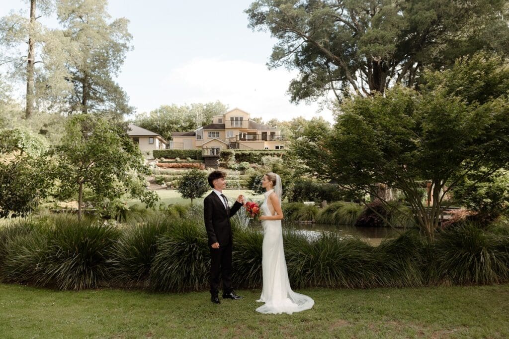 High neck silk wedding dress with chapel-length veil