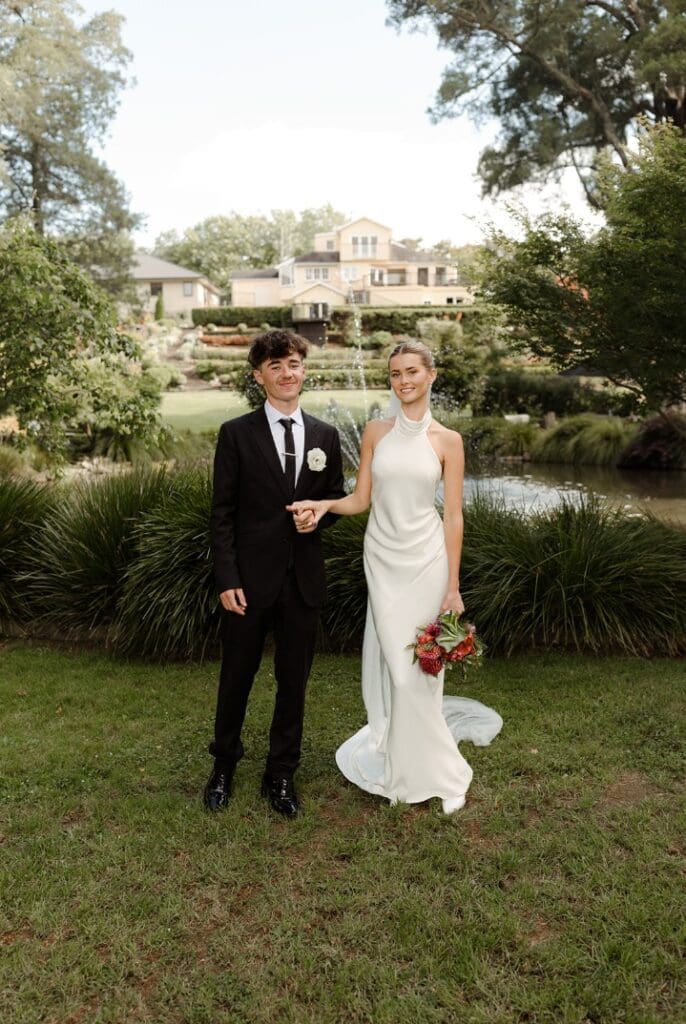Bride wearing the Anderson high neck silk wedding dress
